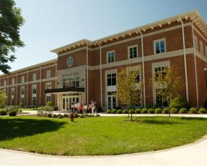 Sutcliff Hall building on Centre College campus. Large brick three-story building.