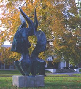 A bronze monument shaped of a flame on the Centre College campus.