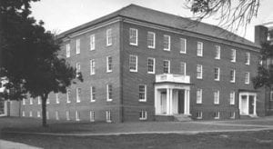 Nevin Hall residental building in Centre College Campus, four-story large brick building with columns.